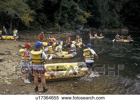 Stock Photography -  white water rafting, Chattooga River, North Georgia, Appalachian Mountains, People getting ready to go white water rafting on the Chattooga Wild & Scenic River in the state of Georgia.. Fotosearch