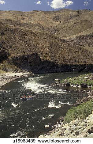 Stock Photo -  white water, rafting, Salmon River, Idaho, Rocky Mountain, A group of people raft down the scenic Salmon River in the state of Idaho.. Fotosearch
