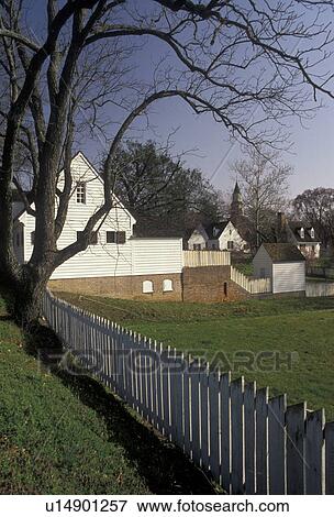 Williamsburg, Colonial Williamsburg Historic Area, Virginia, White picket fence and house in Colonial Williamsburg in the state of Virginia. View Large Photo Image Stock Photo -  Williamsburg, Colonial Williamsburg Historic Area, Virginia, White picket fence and house in Colonial Williamsburg in the state of Virginia.. Fotosearch