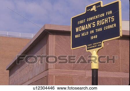 Women's rights, New York, Seneca Falls, Finger Lakes, A sign is displayed at the Women's Rights National Historical Park where the first Women's Rights Convention was held in Seneca Falls. View Large Photo Image Stock Photograph - Women's rights, New York, Seneca Falls, Finger Lakes, A sign is displayed at the Women's Rights National Historical Park where the first Women's Rights Convention was held in Seneca Falls.. Fotosearch