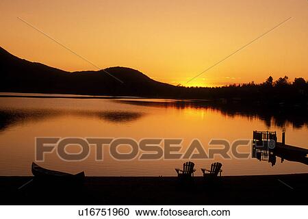Adirondacks, sunrise, lake, New York, Blue Mountain Lake, NY, Sunrise on Blue Mountain Lake in the Adirondacks. View Large Photo Image Stock Image - Adirondacks, sunrise, lake, New York, Blue Mountain Lake, NY, Sunrise on Blue Mountain Lake in the Adirondacks.. Fotosearch