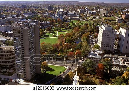 Stock Photo -  aerial, Hartford, Connecticut, CT, Aerial view of Bushnell Park and downtown Hartford from Travelers Tower in the autumn.. Fotosearch