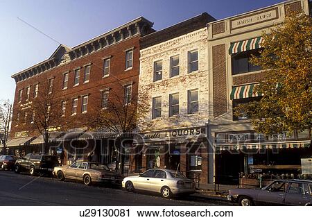 Stock Image -  Amherst, MA, Massachusetts, Stores along street in downtown Amherst in the autumn.. Fotosearch