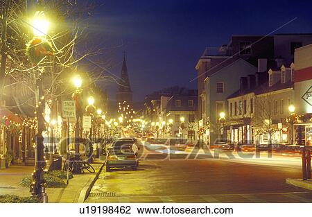 Stock Image -  Annapolis, MD, Maryland, Christmas decorations along Main Street in downtown Annapolis in the evening. . Fotosearch