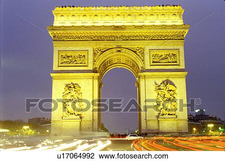 Arc de Triomphe, Paris, France, Europe, Arc de Triomphe at Place Charles de Gaulle illuminated at night in Paris. Headlights of traffic passing around the base of the arc. View Large Photo Image Stock Image - Arc de Triomphe, Paris, France, Europe, Arc de Triomphe at Place Charles de Gaulle illuminated at night in Paris. Headlights of traffic passing around the base of the arc.. Fotosearch