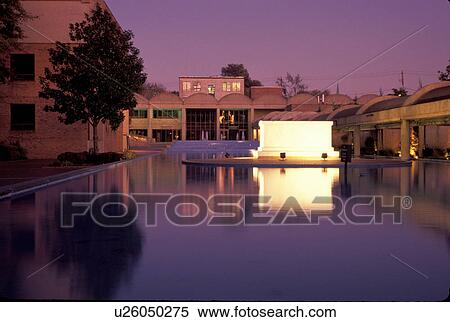 Stock Photography -  Atlanta, MLK, Georgia, GA, Martin Luther King Jr. 's crypt illuminated in the reflecting pool in the evening at the Martin Luther King Jr. Center for Non-violent Social Change at the Martin Luther King Jr. National Historic Site.. Fotosearch