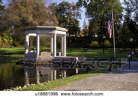 Stock Photo -  bandstand, Saratoga Springs, New York, NY, War Memorial Bandstand in Congress Park in Saratoga Springs in the autumn.. Fotosearch