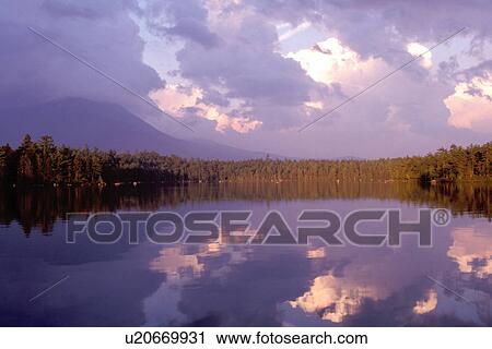 Baxter Park, sunset, Maine, ME, Reflection of Mt. Katahdin in the calm waters of Daicey Pond at sunset in Baxter State Park. View Large Photo Image Stock Image - Baxter Park, sunset, Maine, ME, Reflection of Mt. Katahdin in the calm waters of Daicey Pond at sunset in Baxter State Park.. Fotosearch