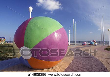 Stock Photograph -  beach ball, Virginia Beach, Virginia, VA, Large colorful beach ball sculpture at the ocean front park in Virginia Beach.. Fotosearch