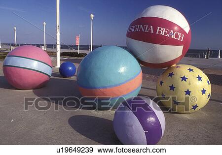 Stock Photo -  beach balls, Virginia Beach, Virginia, VA, Large colorful beach ball sculptures at the ocean front park in Virginia Beach.. Fotosearch