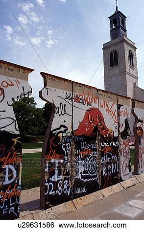 Stock Photograph -  Berlin Wall, church, Winston Churchill, college, Fulton, MO, Missouri, Part of the Berlin Wall outside the Winston Churchill Memorial and Library at the Church of Saint Mary the Virgin, Aldermanbury on Westminster College campus.. Fotosearch