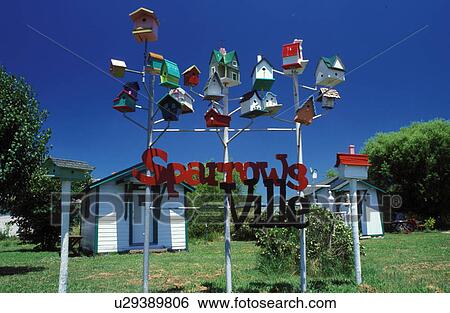 birdhouse, Carthage, MO, Missouri, Colorful birdhouses in Sparrowville at Red Oak II a ghost town.  View Large Photo Image Stock Photograph -  birdhouse, Carthage, MO, Missouri, Colorful birdhouses in Sparrowville at Red Oak II a ghost town. . Fotosearch