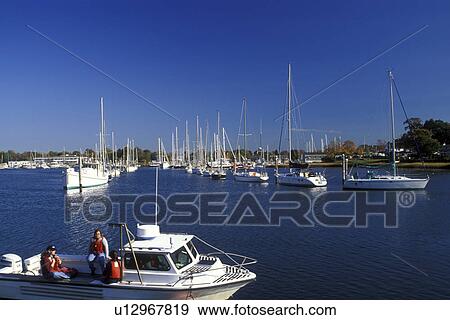 Stock Photo -  boat, Wickford, Rhode Island, RI, Boating on Narragansett Bay in Wickford in the fall.. Fotosearch