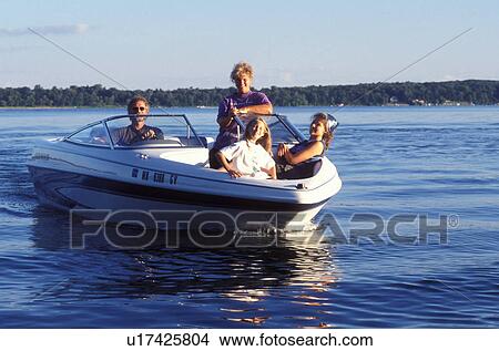 Picture -  boating, lake, MN, Minnesota, Alexandria, Family going for a boat ride on Maple Lake in Alexandria. . Fotosearch