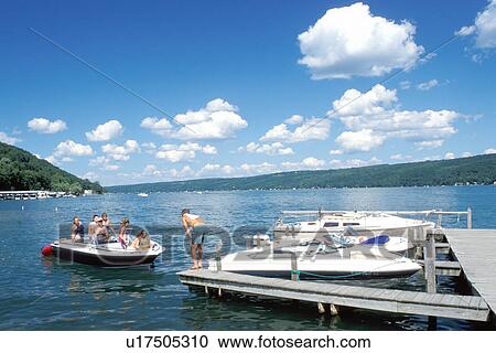 Stock Image -  boating, recreation, Hammondsport, Finger Lakes, Keuka Lake, NY, New York, People boating on a sunny day on Keuka Lake.. Fotosearch