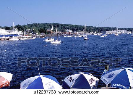 Boothbay Harbor, Maine, ME, Scenic view of Boothbay Harbor from an outdoor cafT with blue and white umbrellas. View Large Photo Image Stock Photo - Boothbay Harbor, Maine, ME, Scenic view of Boothbay Harbor from an outdoor cafT with blue and white umbrellas. . Fotosearch