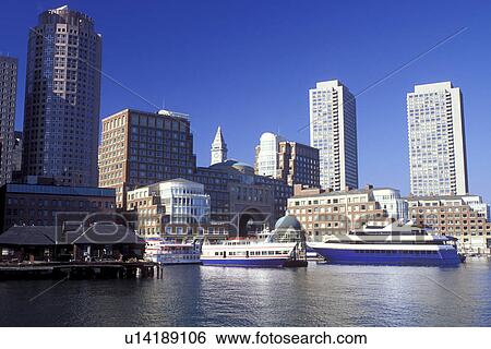 Stock Photograph -  Boston, Massachusetts, MA, Downtown skyline of Boston from Boston Inner Harbor in the autumn.. Fotosearch