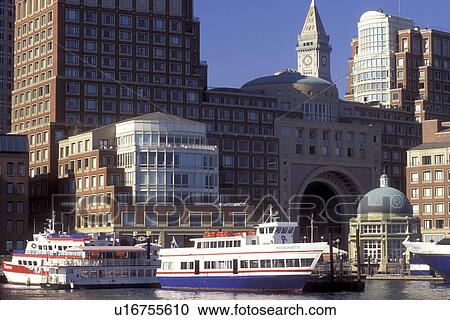 Stock Image -  Boston, Massachusetts, MA, Sightseeing boats moored in Boston Inner Harbor and skyline of downtown Boston.. Fotosearch