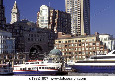 Stock Photo -  Boston, Massachusetts, MA, Sightseeing boats moored in Boston Inner Harbor and skyline of downtown Boston.. Fotosearch