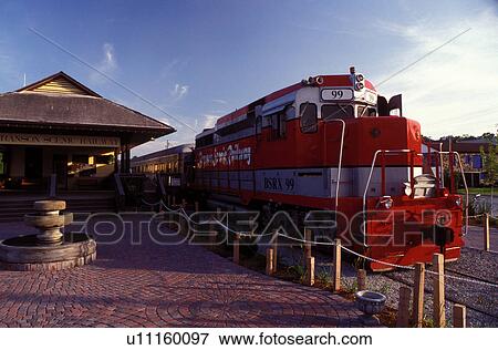 Stock Photo -  Branson, locomotive, train, scenic railway, MO, Missouri, Red locomotive pulls the train at the Branson Scenic Railway in Branson.. Fotosearch