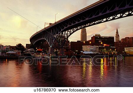 bridge, Cleveland, OH, Ohio, bridge, Flats District, Main Avenue Bridge crosses the Cuyahoga River in the Flats District of downtown Cleveland in the evening. View Large Photo Image Stock Image - bridge, Cleveland, OH, Ohio, bridge, Flats District, Main Avenue Bridge crosses the Cuyahoga River in the Flats District of downtown Cleveland in the evening.. Fotosearch