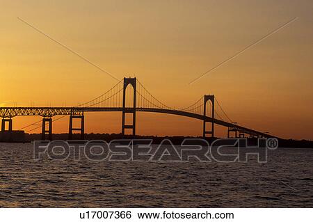bridge, sunset, Newport, Rhode Island, RI, Newport Pell Bridge or Claiborne Pell Bridge crossing over Narragansett Bay in Newport at sunset. View Large Photo Image Stock Photograph - bridge, sunset, Newport, Rhode Island, RI, Newport Pell Bridge or Claiborne Pell Bridge crossing over Narragansett Bay in Newport at sunset.. Fotosearch