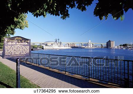 Buffalo, New York, NY, Historical marker at Esplanade Park along the Buffalo River in Buffalo. Birthplace of the Grain Elevator. View Large Photo Image Stock Photography - Buffalo, New York, NY, Historical marker at Esplanade Park along the Buffalo River in Buffalo. Birthplace of the Grain Elevator.. Fotosearch