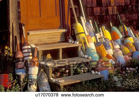 buoys, Rockport, Massachusetts, MA, Fishing buoys leaning against a wall of a red house next to steps in the fall. View Large Photo Image Stock Photo - buoys, Rockport, Massachusetts, MA, Fishing buoys leaning against a wall of a red house next to steps in the fall.. Fotosearch