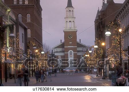Picture -  Burlington, Christmas, decorations, church, winter, snow, city, Vermont, Church Street Marketplace in downtown Burlington is decorated for the Christmas holiday season in the evening in Chittenden County in the state of Vermont. . Fotosearch