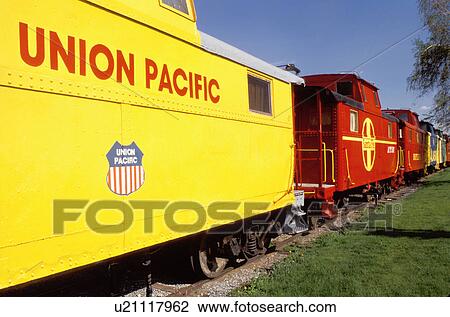 caboose, motel, hotel, Strasburg, Lancaster County, Pennsylvania Dutch Country, Amish Country, Pennsylvania, Colorful red and yellow (Union Pacific and Santa Fe) cabooses at The Red Caboose Motel in Strasburg. View Large Photo Image Stock Image - caboose, motel, hotel, Strasburg, Lancaster County, Pennsylvania Dutch Country, Amish Country, Pennsylvania, Colorful red and yellow (Union Pacific and Santa Fe) cabooses at The Red Caboose Motel in Strasburg.. Fotosearch
