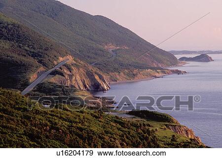 Cabot Trail, Cape Breton, Nova Scotia, NS, Canada, The scenic Cabot Trail winds along seacoast of Cape Breton Highlands National Park on the Gulf of St. Lawrence in Cape Breton. View Large Photo Image Stock Photo - Cabot Trail, Cape Breton, Nova Scotia, NS, Canada, The scenic Cabot Trail winds along seacoast of Cape Breton Highlands National Park on the Gulf of St. Lawrence in Cape Breton. . Fotosearch