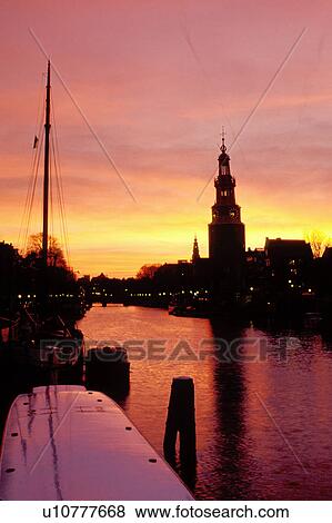 canal, Amsterdam, Holland, The Netherlands, Europe, Scenic view of a canal (grachten) at sunset in downtown Amsterdam. View Large Photo Image Stock Photo - canal, Amsterdam, Holland, The Netherlands, Europe, Scenic view of a canal (grachten) at sunset in downtown Amsterdam. . Fotosearch
