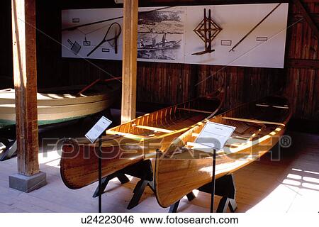 Stock Photograph -  canoe, Clayton, Thousand Islands, New York, NY, Wooden canoes displayed at the Antique Boat Museum.. Fotosearch