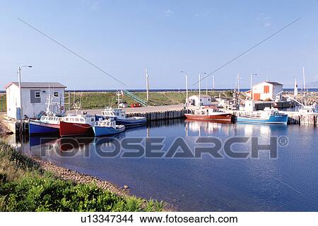 Cape Breton, Nova Scotia, NS, Canada, Fishing boats docked in harbor on Pleasant Bay on the Gulf of St. Lawrence in Cape Breton. View Large Photo Image Picture - Cape Breton, Nova Scotia, NS, Canada, Fishing boats docked in harbor on Pleasant Bay on the Gulf of St. Lawrence in Cape Breton. . Fotosearch