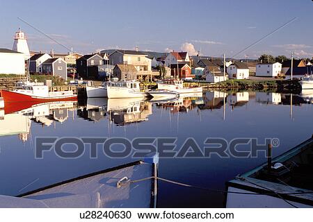 Cape Breton, Nova Scotia, NS, Canada, Fishing boats docked in the harbor of Cheticamp on the Gulf of St. Lawrence in Cape Breton. View Large Photo Image Stock Image - Cape Breton, Nova Scotia, NS, Canada, Fishing boats docked in the harbor of Cheticamp on the Gulf of St. Lawrence in Cape Breton. . Fotosearch