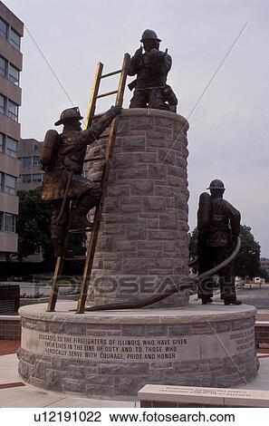 Stock Image -  capitol, Springfield, State Capitol, Statehouse, IL, Illinois, Firefighter Memorial on The Illinois State Capitol grounds in the capital city of Springfield, Illinois. . Fotosearch