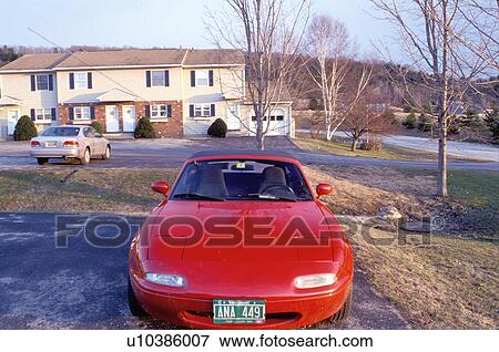 Stock Photo -  car, red sports car, convertible, Mazda Miata in Montpelier Vermont. Fotosearch
