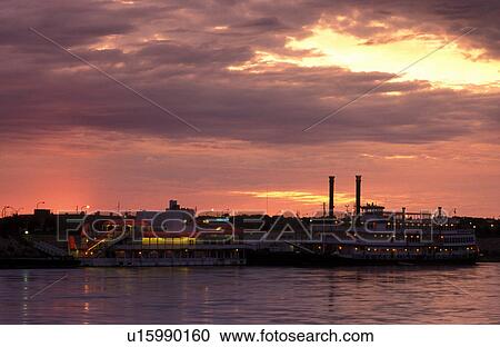Stock Image -  casino, riverboat, Sioux City, IA, Iowa, Belle of Sioux City Riverboat Casino on the Missouri River at sunrise in Sioux City.. Fotosearch
