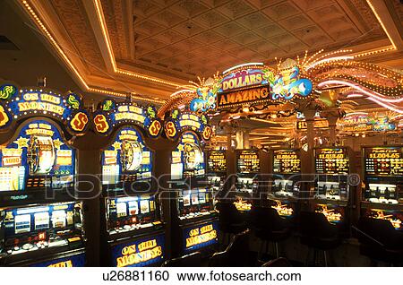 Stock Image -  casino, slot machines, Las Vegas, Nevada, NV, The Strip, Slot machines inside the casino at the Monte Carlo Resort & Casino in Las Vegas, the Entertainment Capital of the World.. Fotosearch