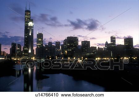 Chicago, skyline, evening, Illinois, IL, Downtown skyline of Chicago along the Chicago River in the evening. View Large Photo Image Stock Image - Chicago, skyline, evening, Illinois, IL, Downtown skyline of Chicago along the Chicago River in the evening.. Fotosearch