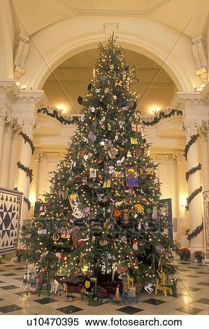 Stock Photography -  Christmas tree, State House, State Capitol, Annapolis, MD, Maryland, A Christmas tree decorates the foyer of the Maryland State House in the capital city of Annapolis.. Fotosearch