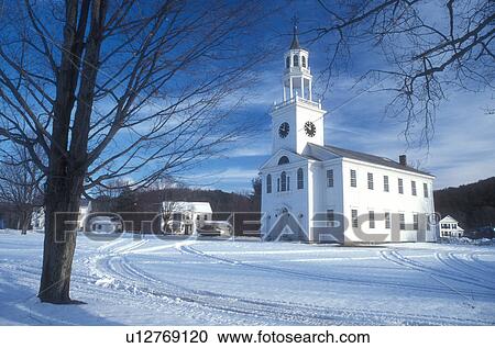 Stock Image -  church, chapel, winter, snow, The Baptist Church of East Poultney on a beautiful sunny day in winter in Rutland County in the state of Vermont. . Fotosearch
