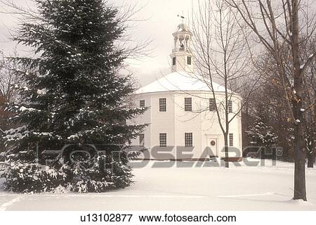 church, chapel, winter, snow, town, holiday, Vermont, The Old Round Church (a 16-sided polygon) National Historical Landmark on a snow covered day in Richmond in Chittenden County in the state of Vermont. View Large Photo Image Stock Photo - church, chapel, winter, snow, town, holiday, Vermont, The Old Round Church (a 16-sided polygon) National Historical Landmark on a snow covered day in Richmond in Chittenden County in the state of Vermont. . Fotosearch