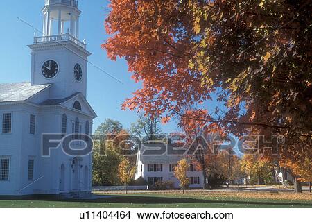 Picture -  church, fall, maple tree, East Poultney, VT, Vermont, Picturesque view of The United Baptist Church in autumn in East Poultney.. Fotosearch