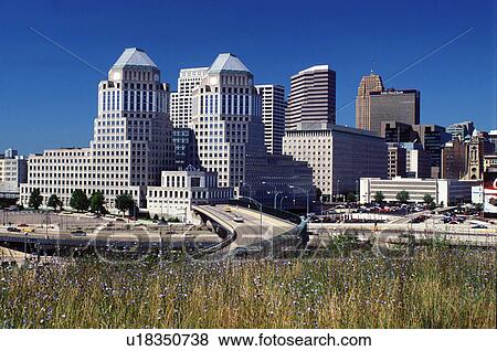 Stock Photo -  Cincinnati, OH, expressway, downtown skyline, Ohio, Expressway ramp leads to downtown Cincinnati.. Fotosearch