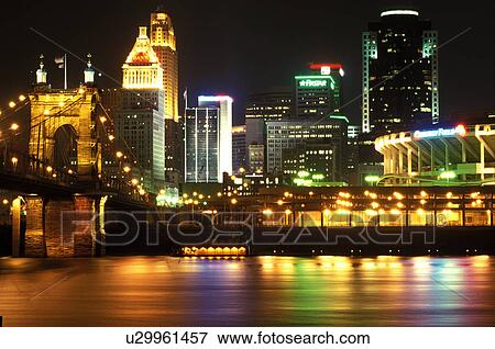 Cincinnati, skyline, OH, Ohio, Downtown skyline of Cincinnati across the Ohio River at night. View Large Photo Image Stock Photo - Cincinnati, skyline, OH, Ohio, Downtown skyline of Cincinnati across the Ohio River at night. . Fotosearch