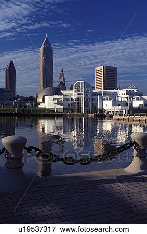 Stock Photo -  Cleveland, OH, Ohio, Skyline of downtown Cleveland and the Great Lakes Science Center along the waterfront of North Coast Harbor.. Fotosearch