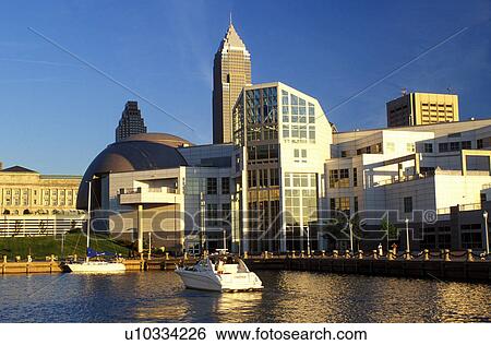 Stock Photograph -  Cleveland, OH, Ohio, Skyline of downtown Cleveland and the Great Lakes Science Center along the waterfront of North Coast Harbor.. Fotosearch