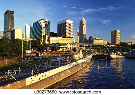 Stock Image -  Cleveland, skyline, OH, Ohio, Downtown skyline of Cleveland, USS Cod Submarine Museum, Lake Erie. Fotosearch