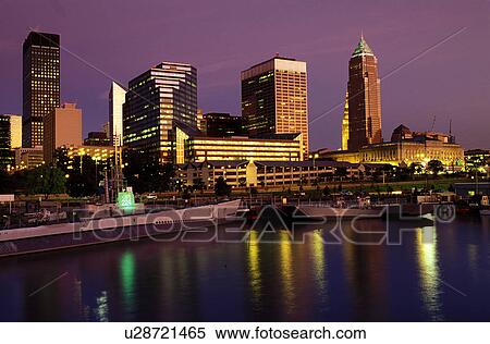 Stock Photography -  Cleveland, skyline, OH, Ohio, Downtown skyline of Cleveland, USS Cod Submarine Museum, Lake Erie, evening. Fotosearch